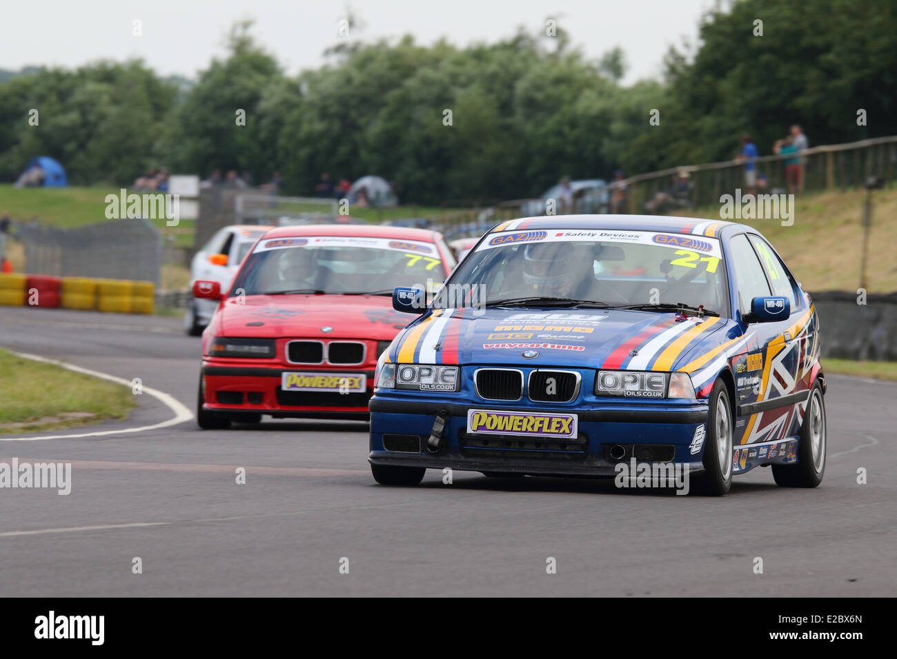 Cars racing at Castle Combe Circuit Stock Photo - Alamy