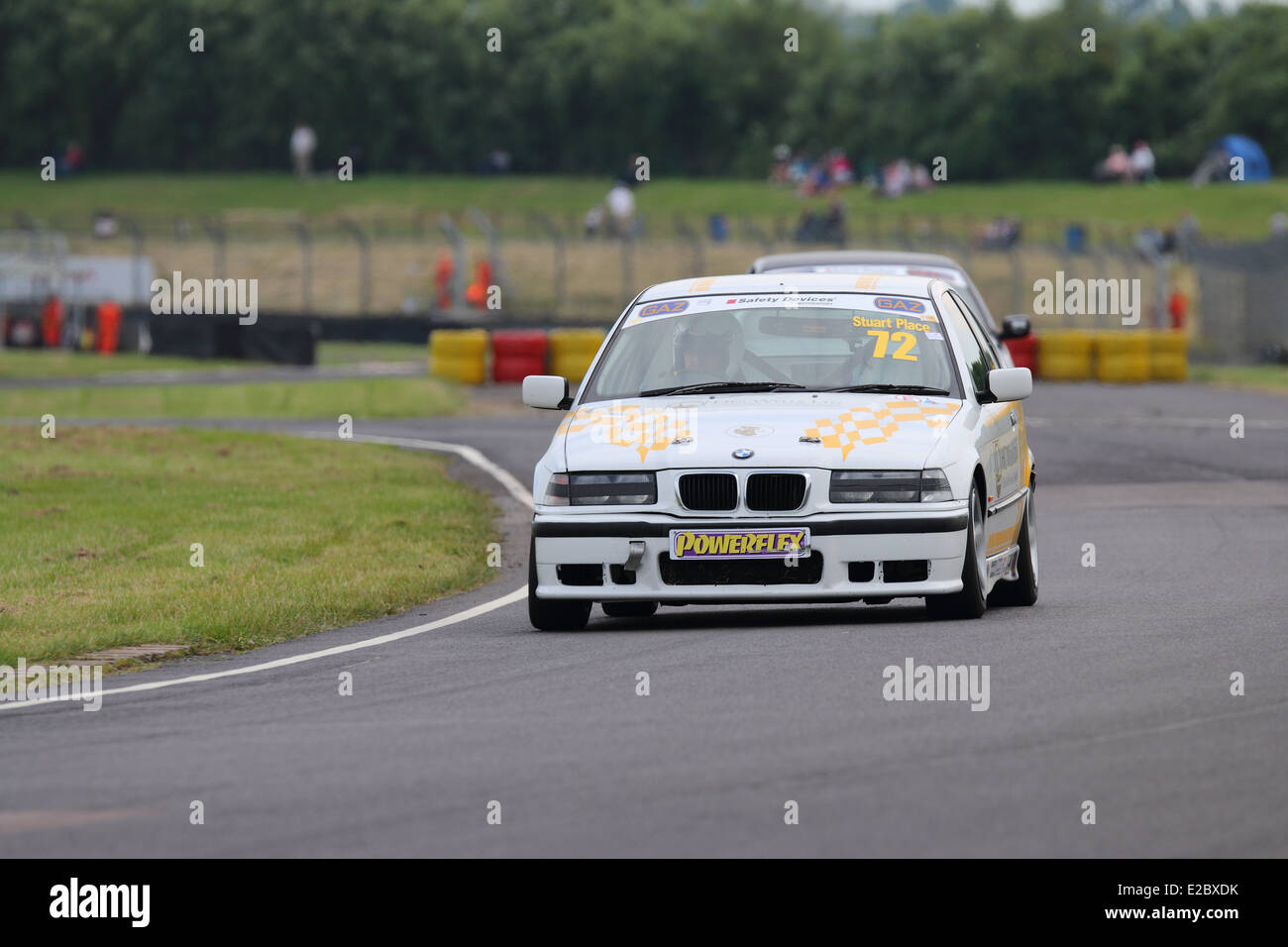 Cars racing at Castle Combe Circuit Stock Photo - Alamy