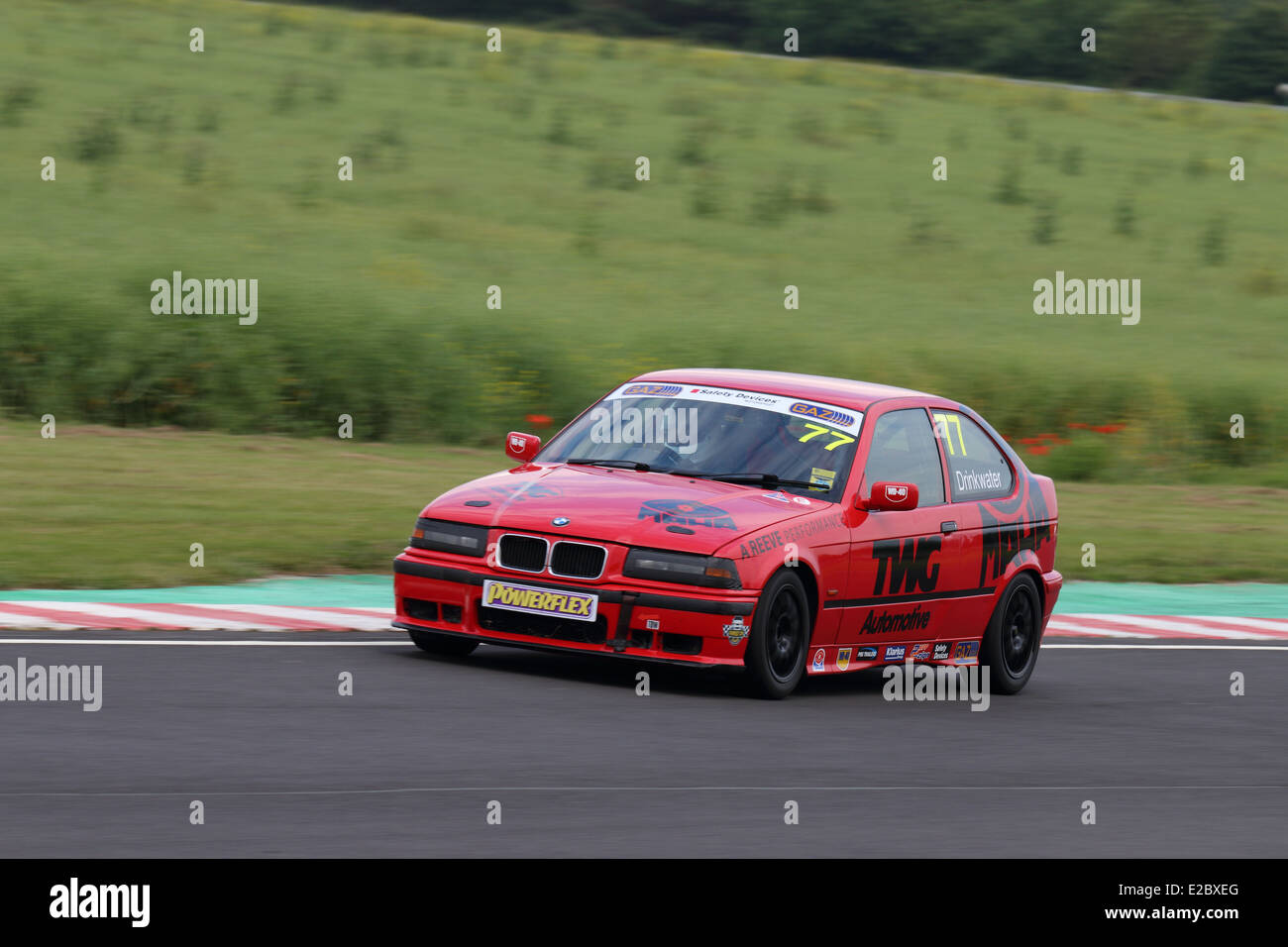 Cars racing at Castle Combe Circuit Stock Photo - Alamy