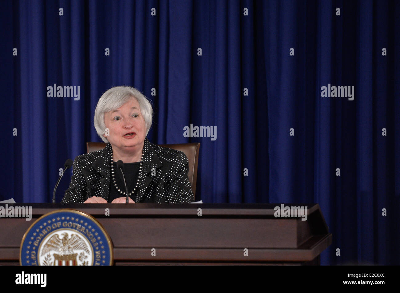 Washington, US. 18th June, 2014. US Federal Reserve Chair Janet Yellen speaks during a press conference at Federal Reserve Board building in Washington, DC, capital of the United States, June 18, 2014. The US Federal Reserve announced Wednesday that it will continue tapering its monthly bond purchase program by another 10 billion U.S. dollars next month, after lowering its growth forecast for the world's largest economy this year. Credit:  Xinhua/Alamy Live News Stock Photo