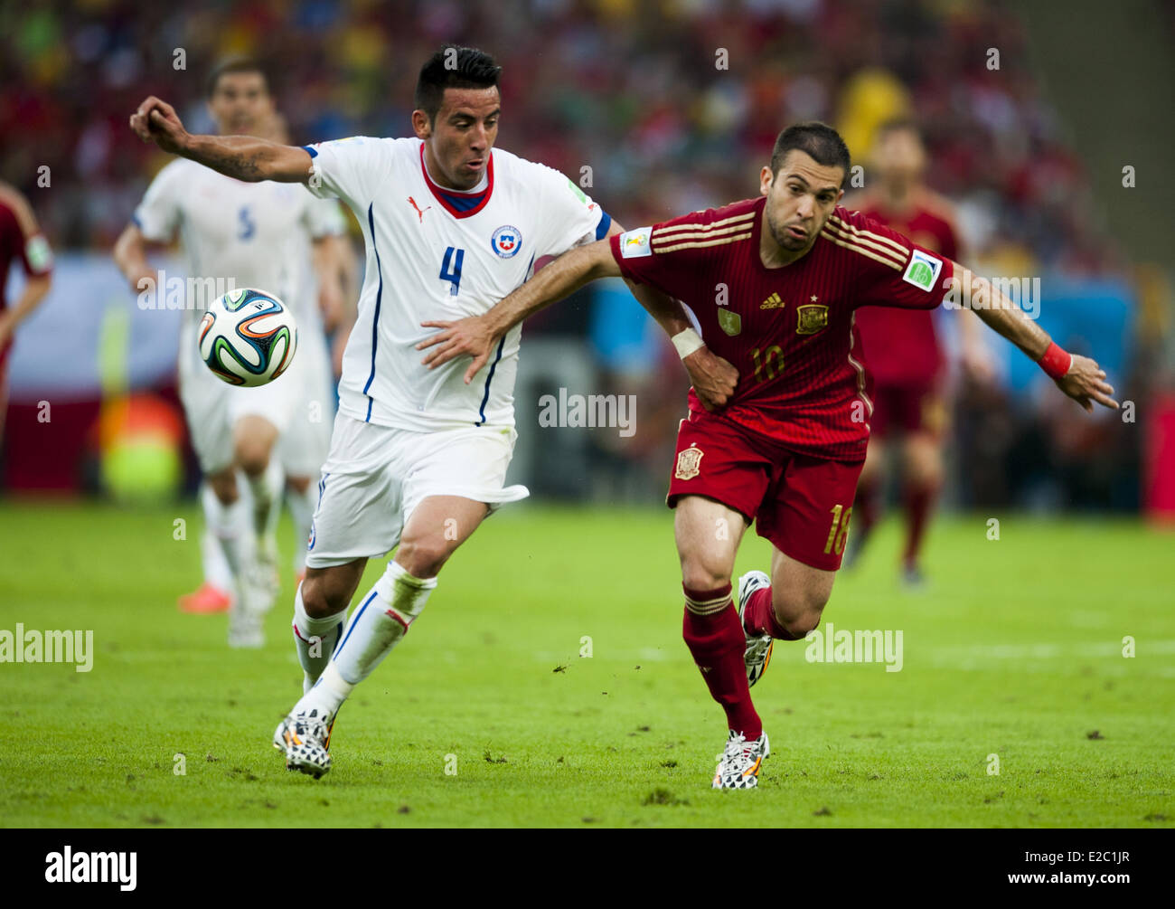 Porto Alegre, Brazil. 18th June, 2014.  Mauricio Isla and Jordi Alba in the match between Spain and Chile in the group stage of the 2014 World Cup, for the group B match at the Beira Rio stadium, on June 18, 2014  Credit:  Urbanandsport/NurPhoto/ZUMAPRESS.com/Alamy Live News Stock Photo