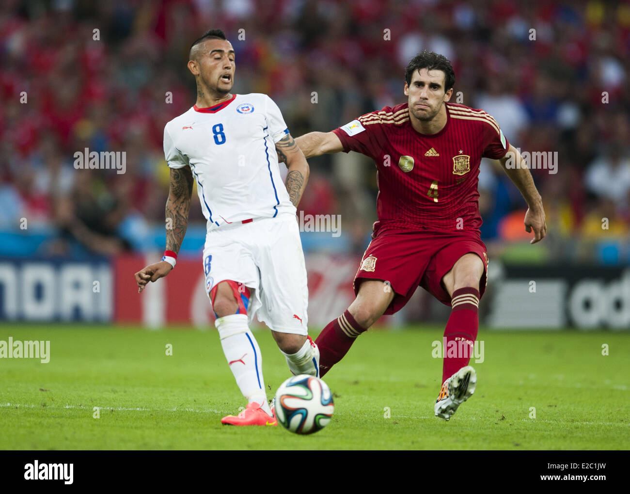 Porto Alegre, Brazil. 18th June, 2014.  Arturo Vidal and Javi Martinez in the match between Spain and Chile in the group stage of the 2014 World Cup, for the group B match at the Beira Rio stadium, on June 18, 2014  Credit:  Urbanandsport/NurPhoto/ZUMAPRESS.com/Alamy Live News Stock Photo