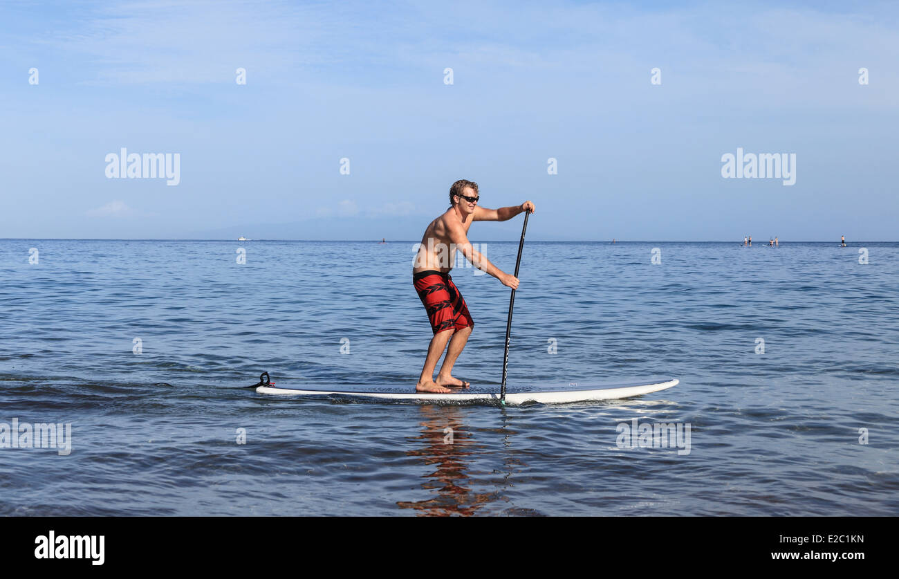 Man   stand up paddling at Wailea Beach on Maui Stock Photo