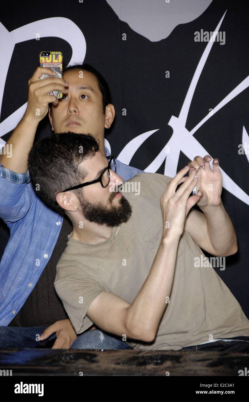 Los Angeles, CA, USA. 18th June, 2014. Joe Hahn, Brad Delson at the induction ceremony for Guitar Center RockWalk Inducts Linkin Park, Sunset Boulevard, Los Angeles, CA June 18, 2014. Credit:  Michael Germana/Everett Collection/Alamy Live News Stock Photo