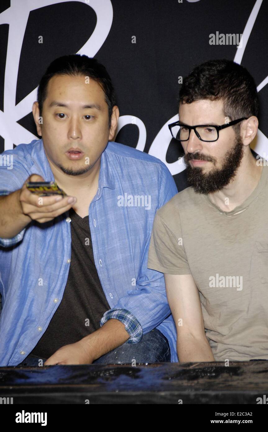 Los Angeles, CA, USA. 18th June, 2014. Joe Hahn, Brad Delson at the induction ceremony for Guitar Center RockWalk Inducts Linkin Park, Sunset Boulevard, Los Angeles, CA June 18, 2014. Credit:  Michael Germana/Everett Collection/Alamy Live News Stock Photo