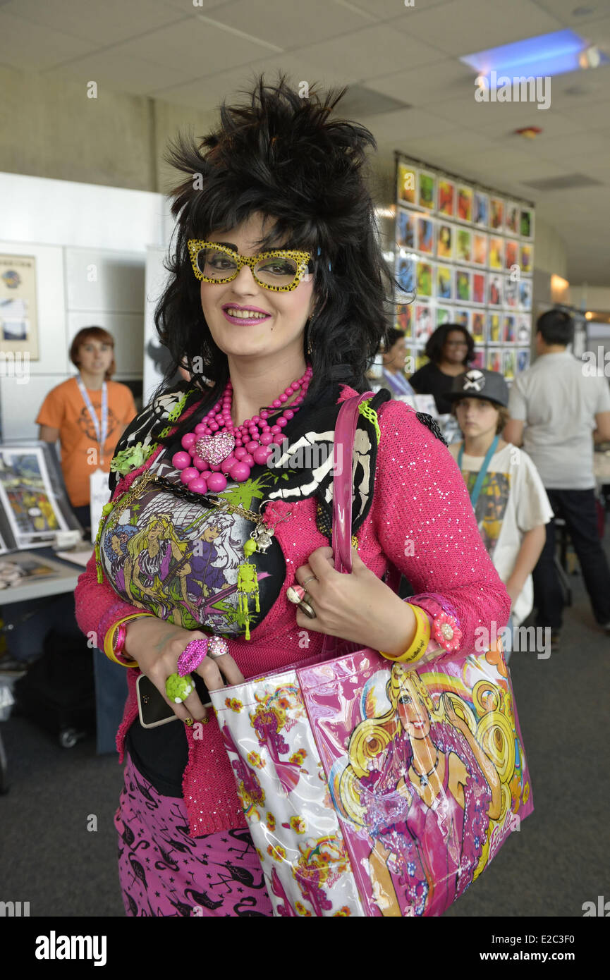 Garden City, New York, USA. 14th June, 2014. LINDSAY LOWE, a cartoon couture fashionista who's a TV personality on PA LIVE in Pennsylvania, wears colorful yellow sunglasses and neon pink outfit at Eternal Con, the Long Island Comic Con Pop Culture Expo, held at the Cradle of Aviation Museum. © Ann Parry/ZUMA Wire/ZUMAPRESS.com/Alamy Live News Stock Photo