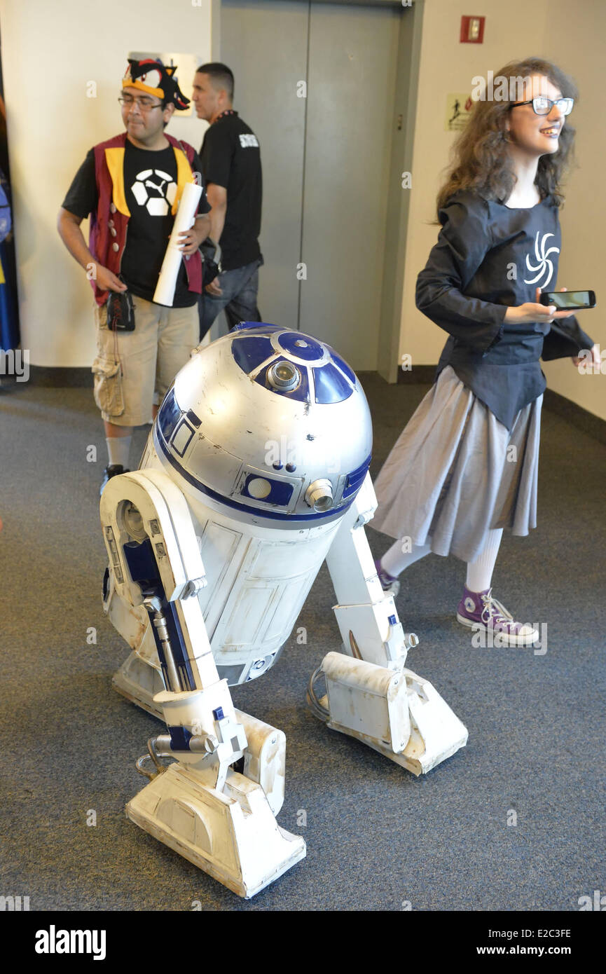 Garden City, New York, USA. 14th June, 2014. R2-D2, the Star Wars robot,  walks among visitors wearing cosplay costumes at Eternal Con, the Long  Island Comic Con Pop Culture Expo, held at