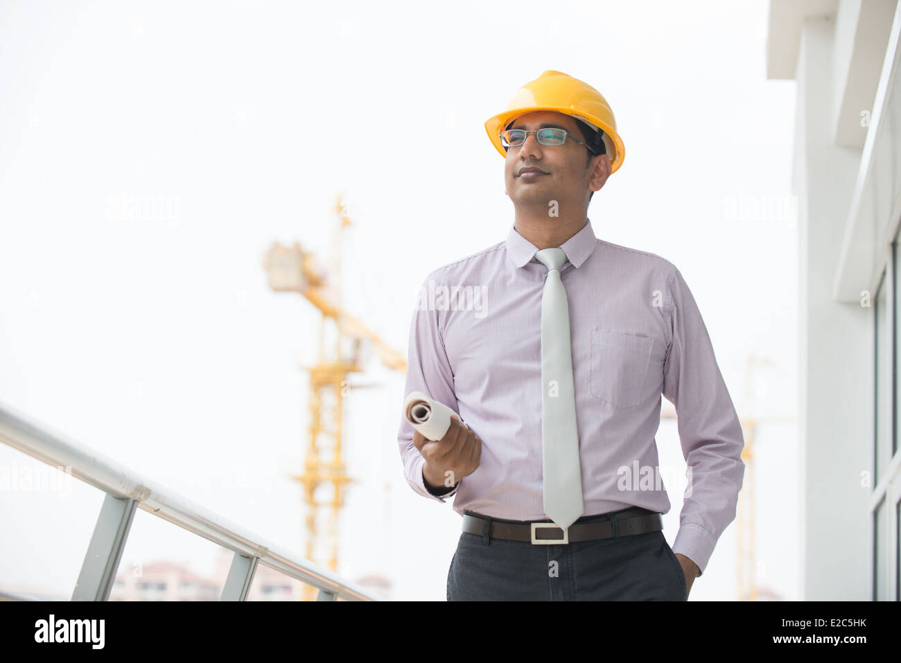 indian male engineer inspecting site with construction background Stock  Photo - Alamy