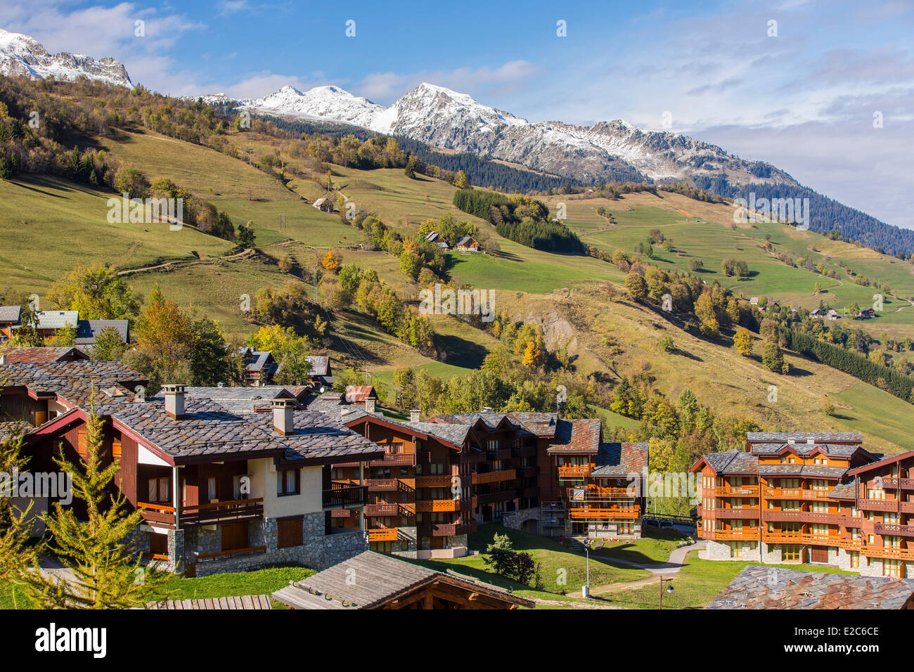 France, Savoie, Valmorel, chalets of S'Fontaine with a view of the chain of La Lauziere, massif of La Vanoise, Tarentaise valley Stock Photo