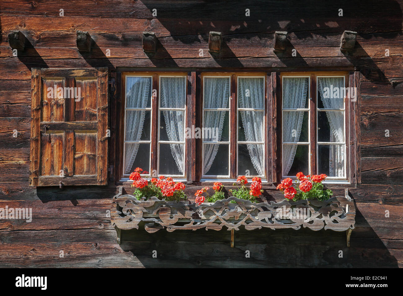 Switzerland, Canton of Valais, mountain lodge windows Stock Photo