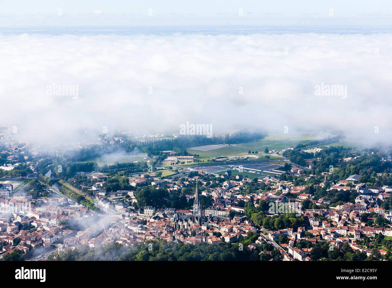 France, Vendee, Fontenay le Comte, the city under the fog (aerial view) Stock Photo
