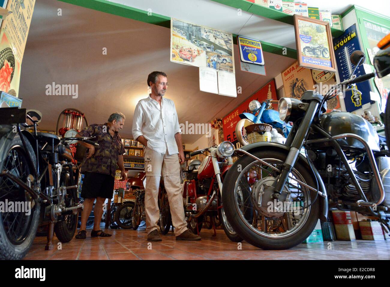 France, Herault, Boujan sur Libron, Chapy museum, exhibition of former motorcycles, visitor in a path Stock Photo