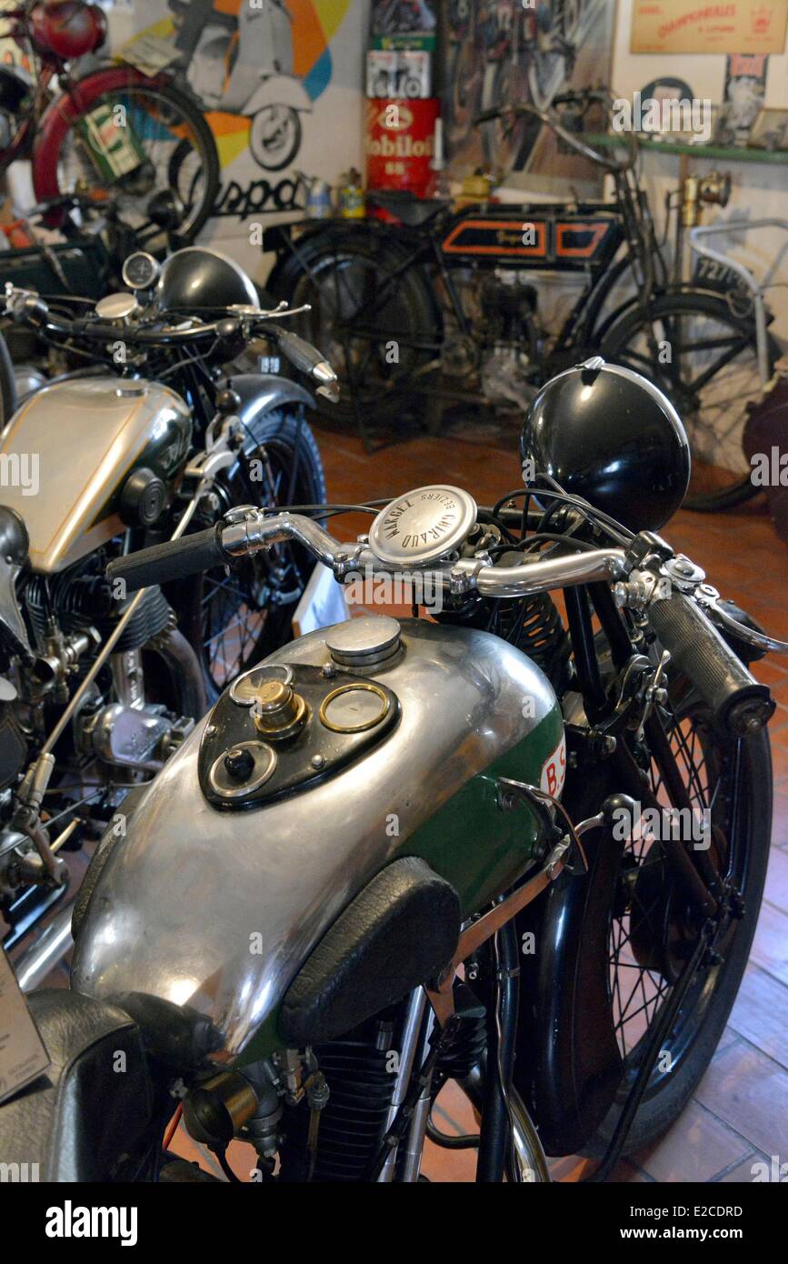 France, Herault, Boujan sur Libron, Chapy museum, exhibition of former motorcycles in the middle of posters of time, detail of handlebars and reservoir Stock Photo