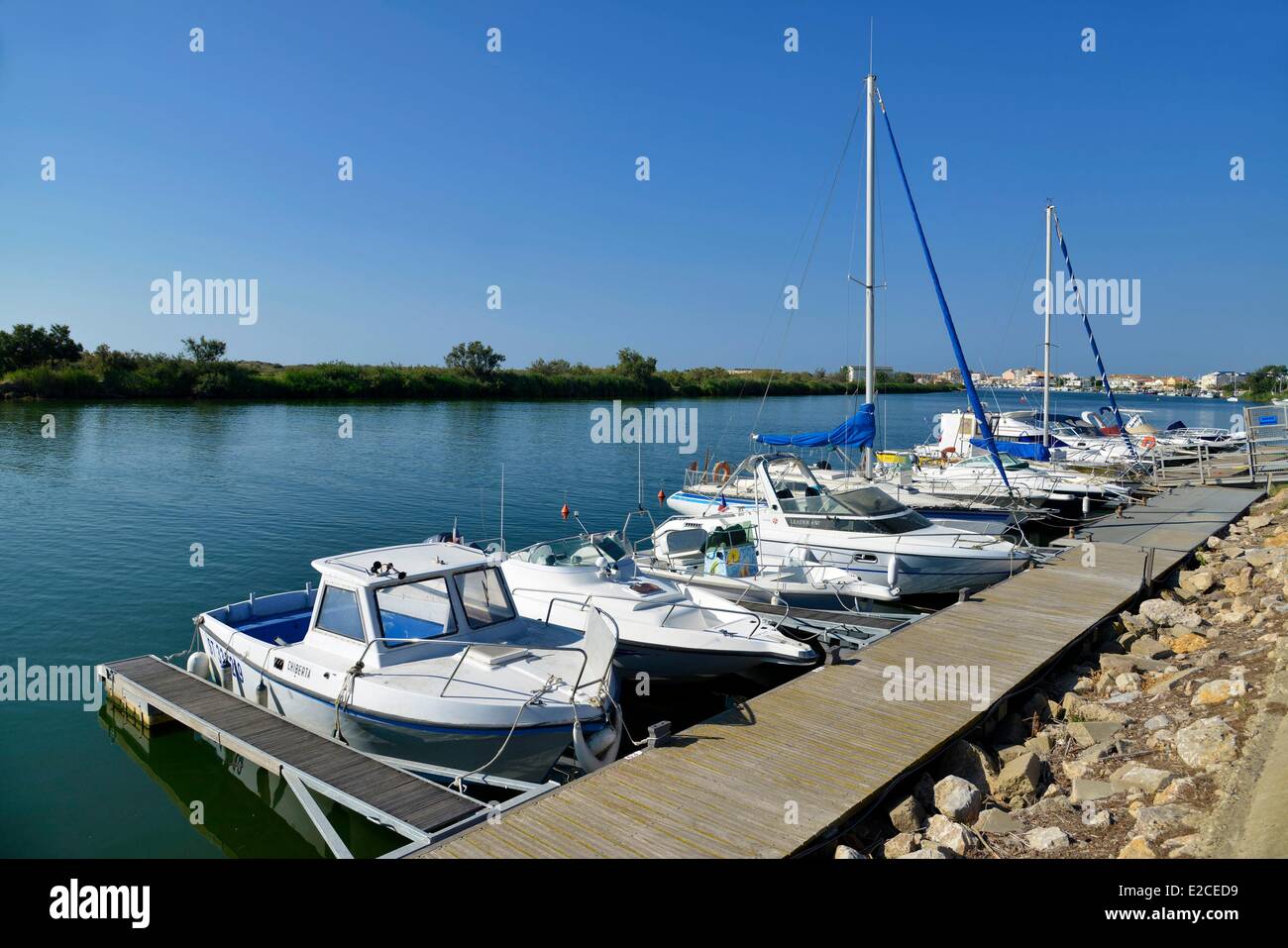 France, Herault, Serignan, Marina, boats alongside the quay on the river Orb Stock Photo