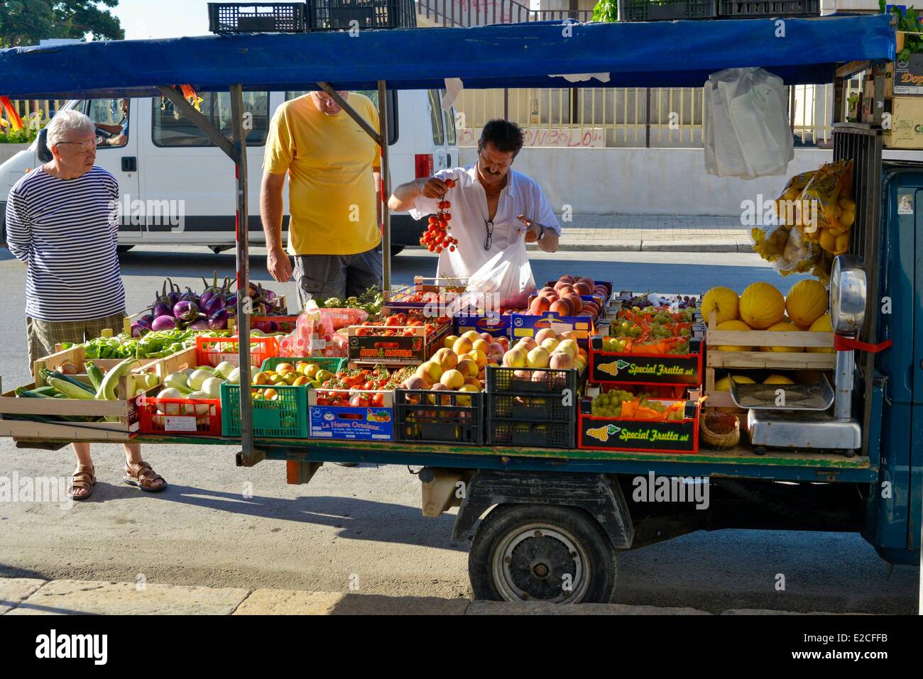 Italy, Sicily, Trapani, historic center, peddler of fruits and