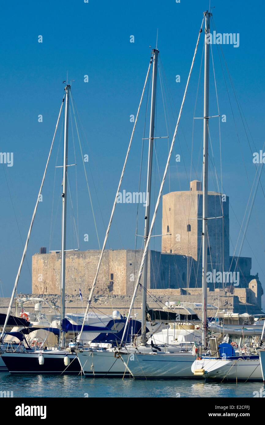 Italy, Sicily, Trapani, historic center, Marina, sailboats docked with the fortress of the Dove of the 3rd century in the background whose construction is attributed to the Carthaginian Hamilcar Barca Stock Photo