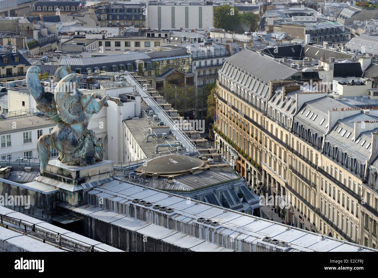 France, Paris, winged horse statue on the roof of the Opera Garnier overlooking the Rue Scribe Stock Photo
