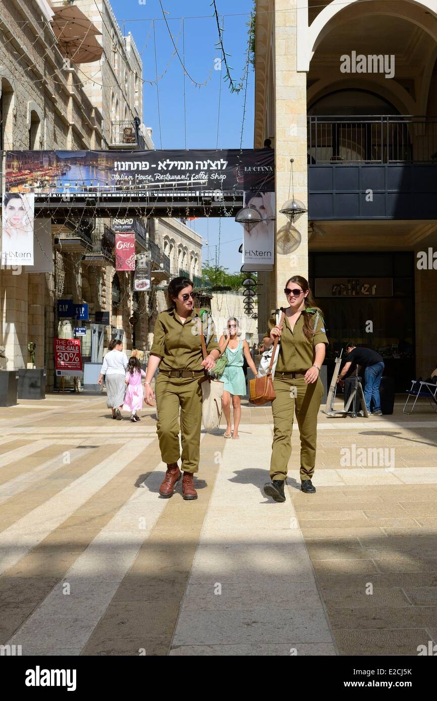 Israel, Jerusalem, Mamilla mall and luxury pedestrian shopping street in the modern city, military women while shopping Stock Photo