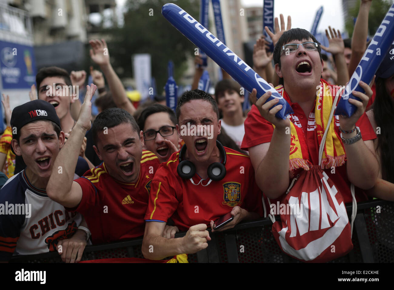 Madrid, Spain. 18th June, 2014. Spanish soccer fans shout slogans and