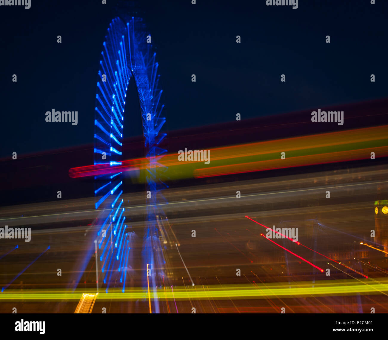 Central London Westminster London Eye , Millennium Wheel , bus lights , at night with zoom blur abstract art artistic movement Stock Photo