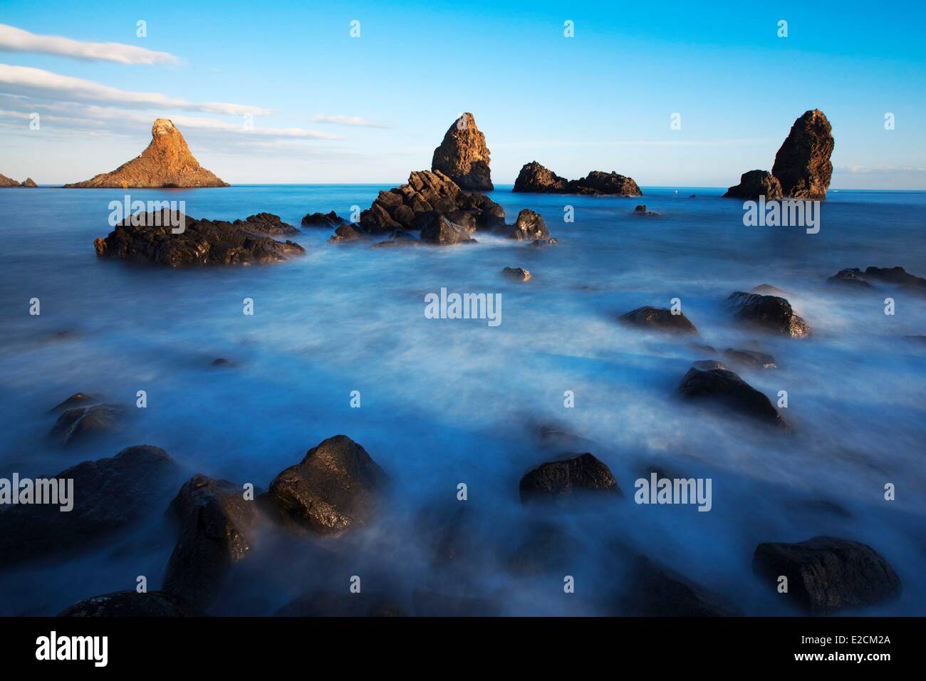 Italy Sicily Catania Province Aci Trezza Faraglioni rocks Stock Photo