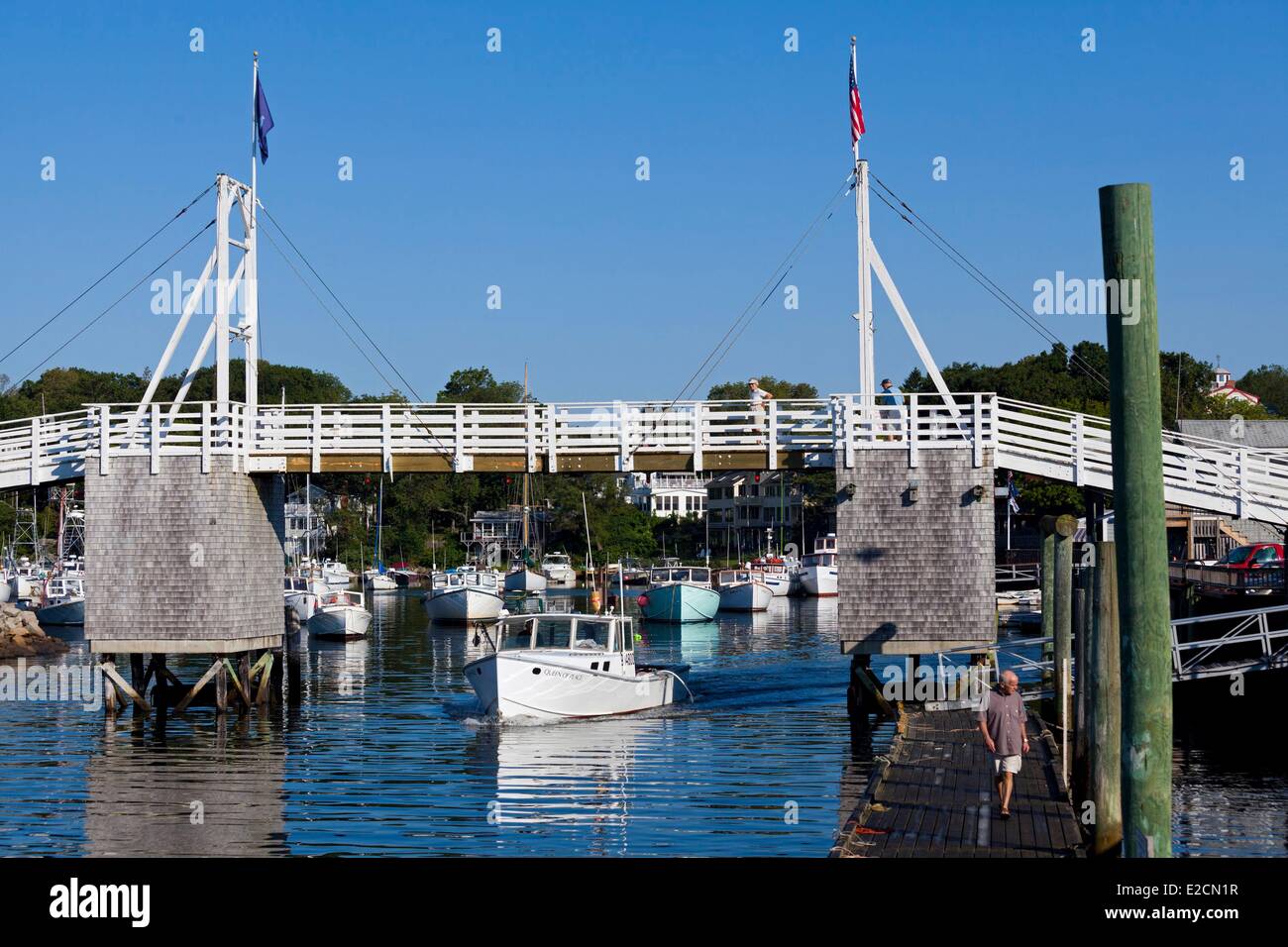 United States Maine Ogunquit Perkins Cove fishing boat passing under
