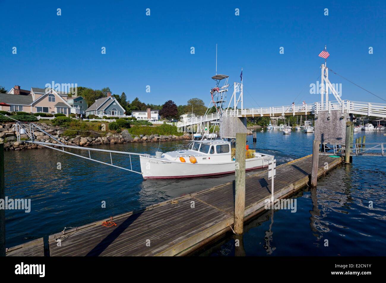 United States Maine Ogunquit Perkins Cove fishing boat passing under