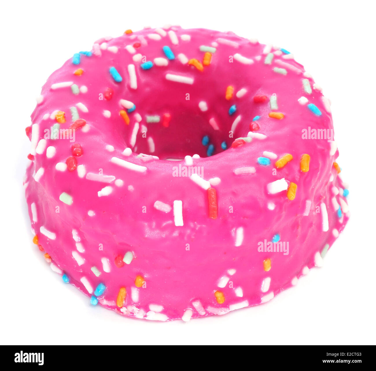 a donut coated with a pink frosting and sprinkles of different colors