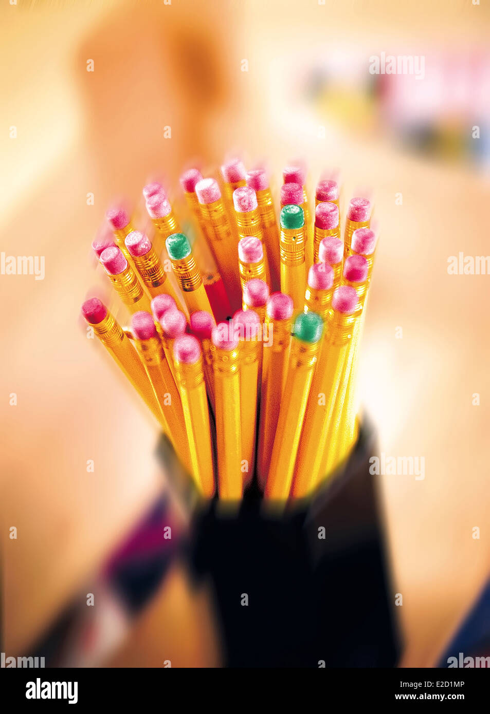 Pencils with erasers in holder Stock Photo Alamy