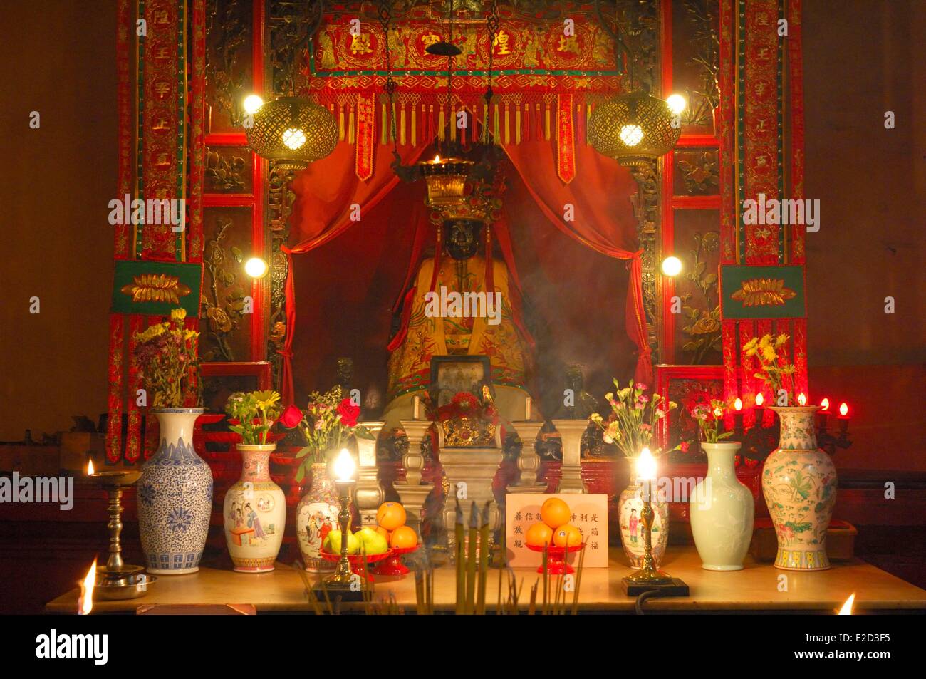 China Hong Kong Man Mo Temple vases of flowers placed on an altar at