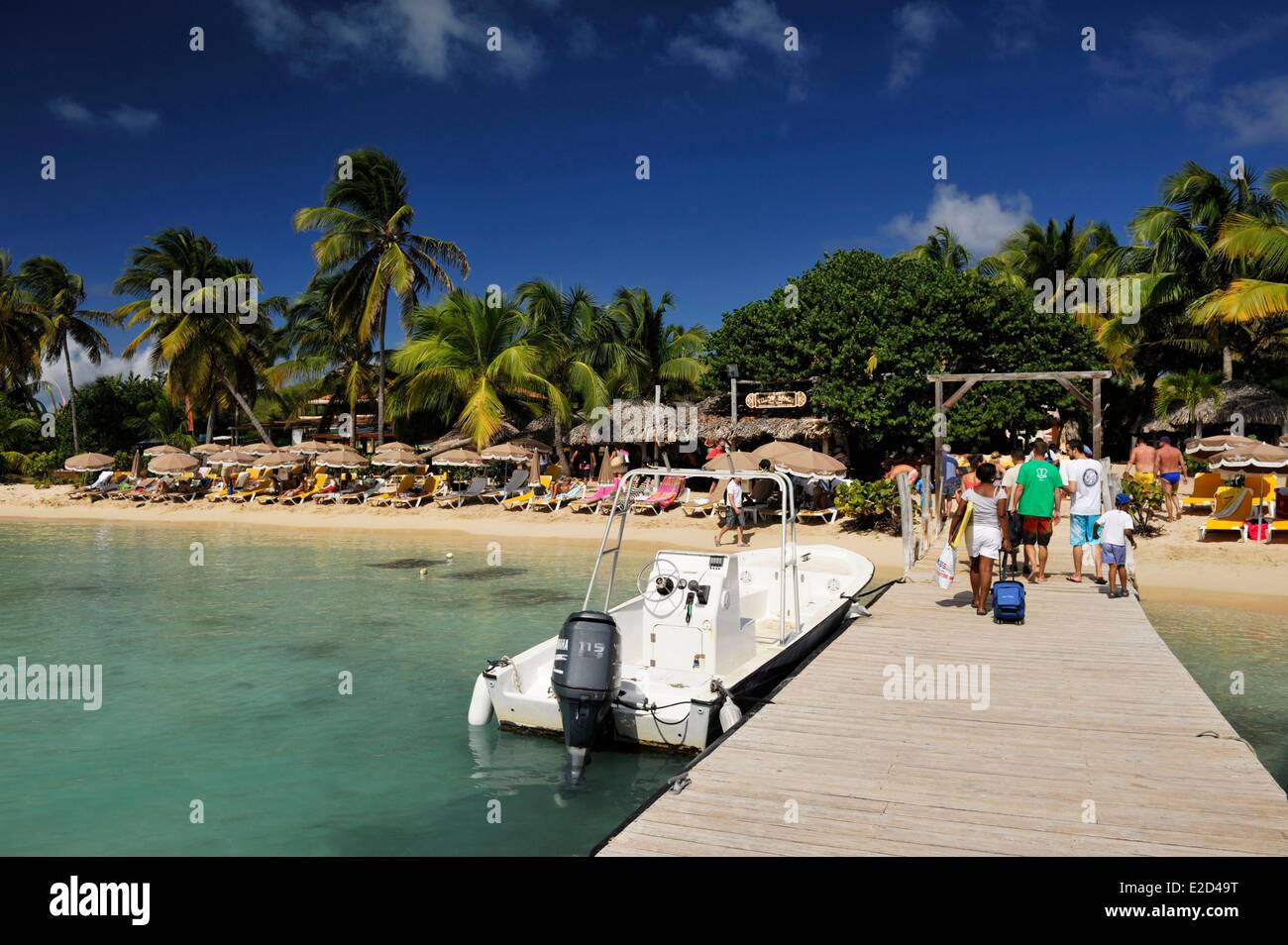 France Guadeloupe Saint Martin Cul de Sac Pinel Island tourists on the pontoon leading to the beach exotic Stock Photo