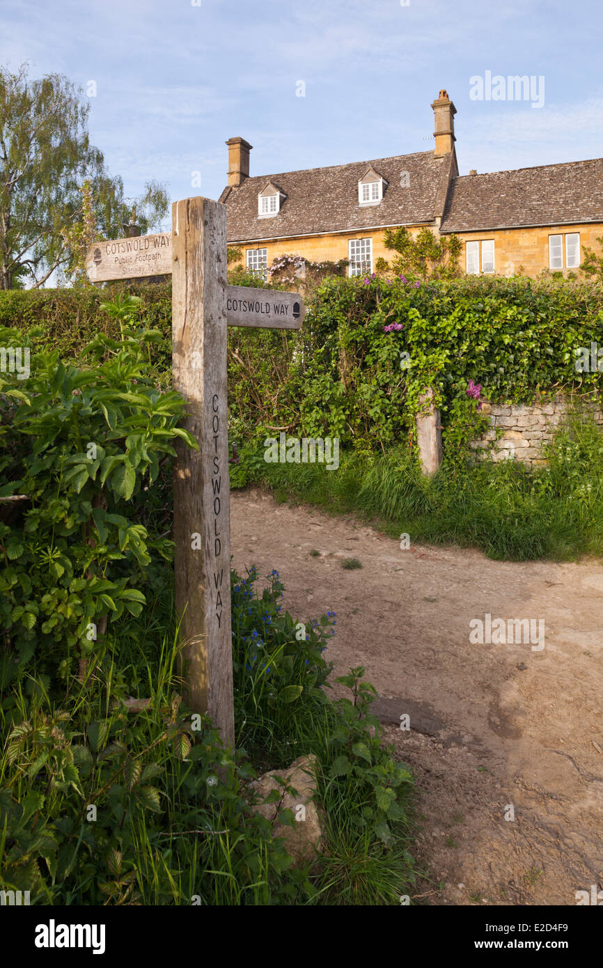 A signpost for the Cotswold Way National Trail in the Cotswold village