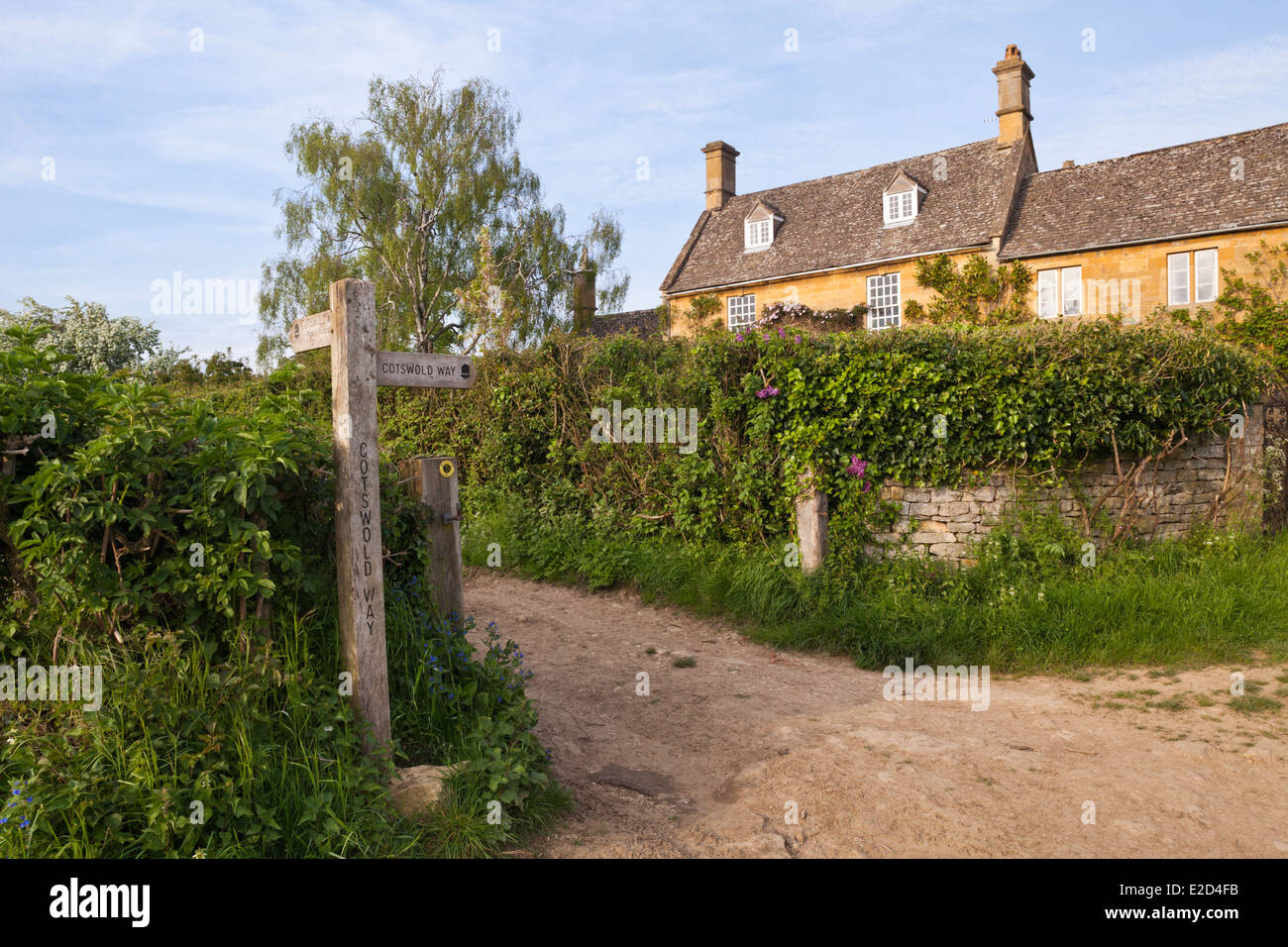 A signpost for the Cotswold Way National Trail in the Cotswold village