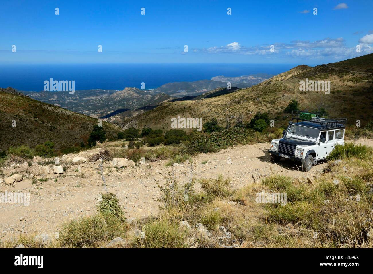 France, Haute Corse, Balagne, discovery of the Giussani in 4x4 vehicle using a track around the Bocca di a Battaglia Stock Photo