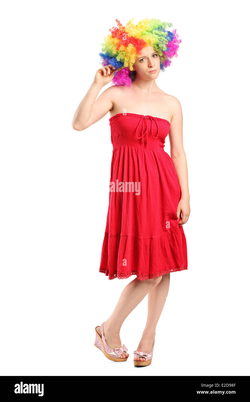 Full length portrait of a young sad woman with a wig Stock Photo