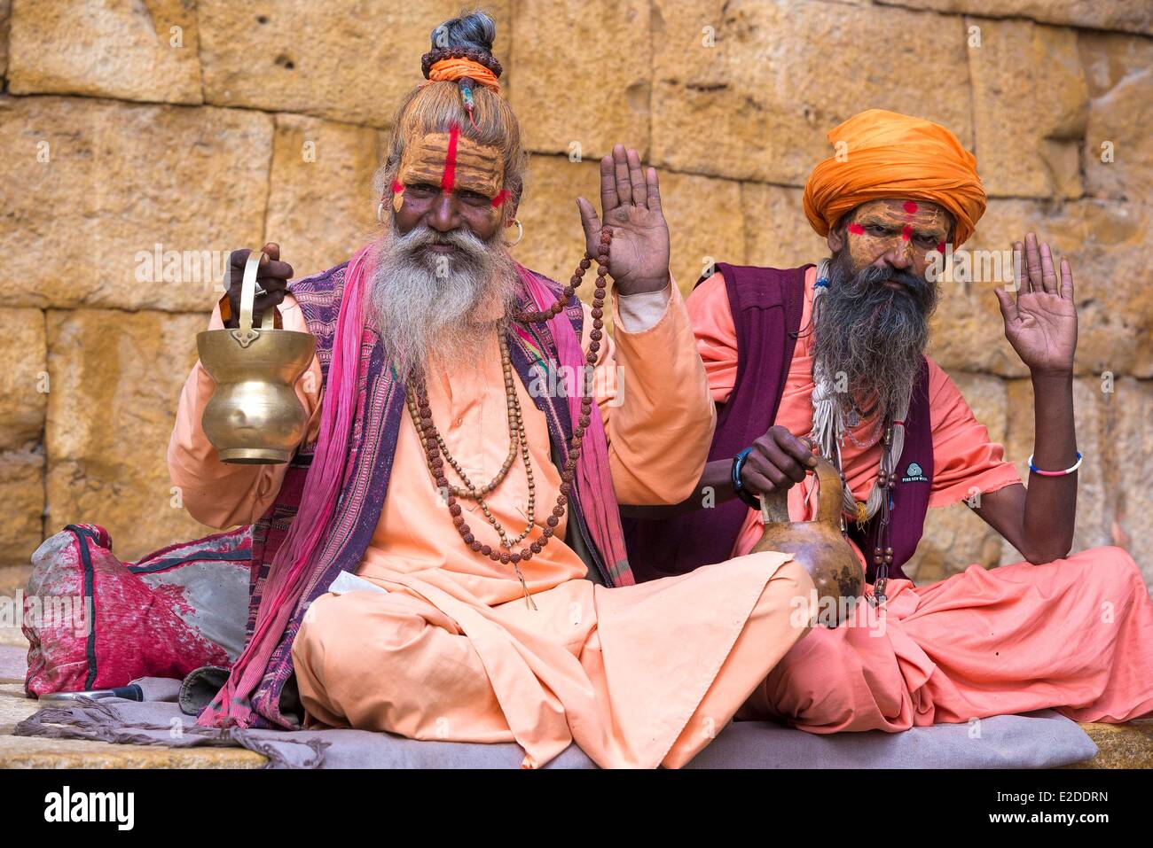 India Rajasthan state hill fort of Rajasthan listed as World Heritage by UNESCO Jaisalmer Sadhus holy men in front of the Fort Stock Photo