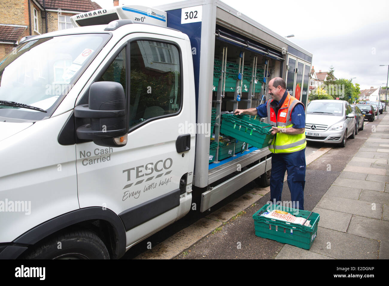 Tesco delivery service where shoppers order their groceries online and have them delivered on the same day, London, UK Stock Photo