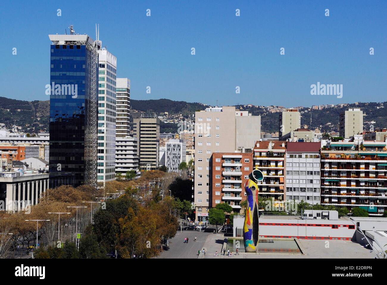 Spain Catalonia Barcelona Joan Miro park and Miro sculpture Woman and bird Dona i ocell seen from the roof terrace of shopping Stock Photo