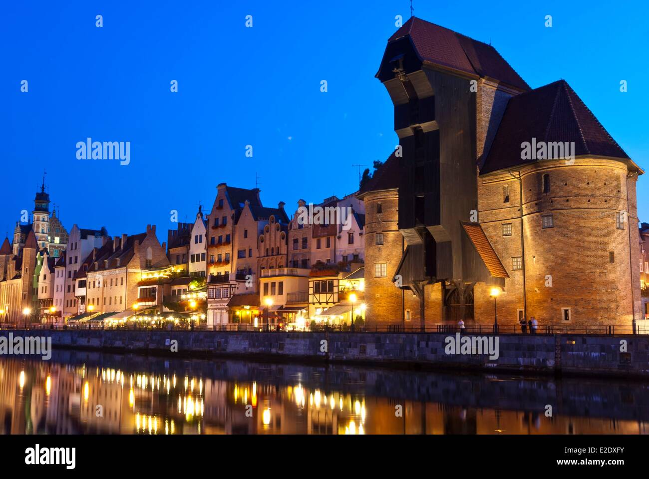 Poland Eastern Pomerania Gdansk the historic Quayside (Dlugie Pobrzeze) of the old harbour and the medieval wooden port crane Stock Photo