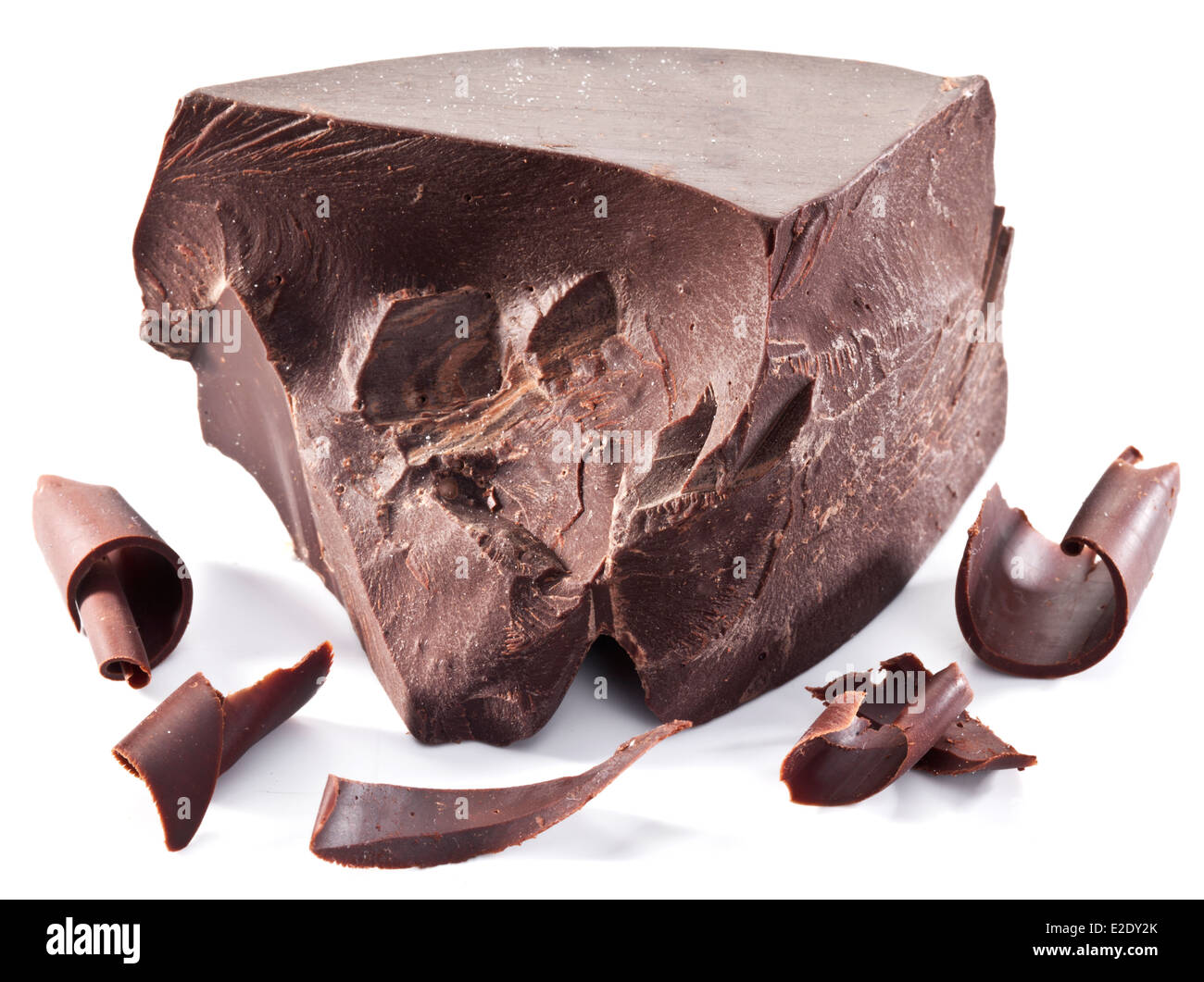Chocolate block and chips near it isolated on a white background. Stock Photo