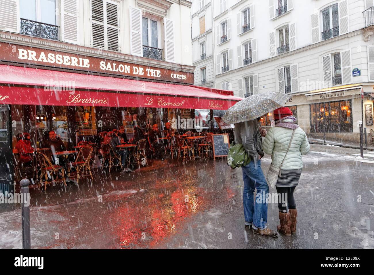 France Paris brasserie Chappe street Montmartre under snow Stock Photo