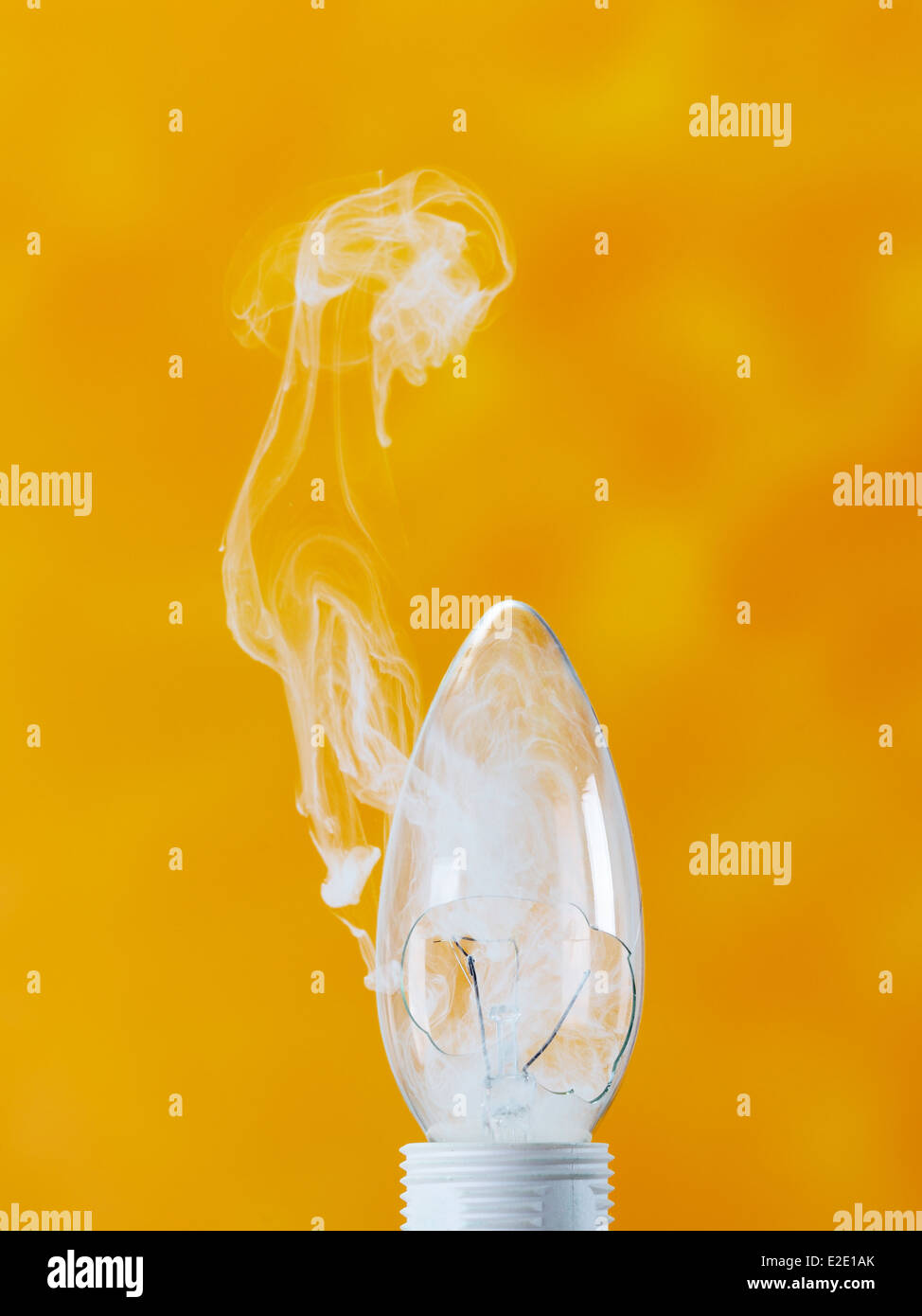 bulb exploding with fire and smoke Stock Photo Alamy
