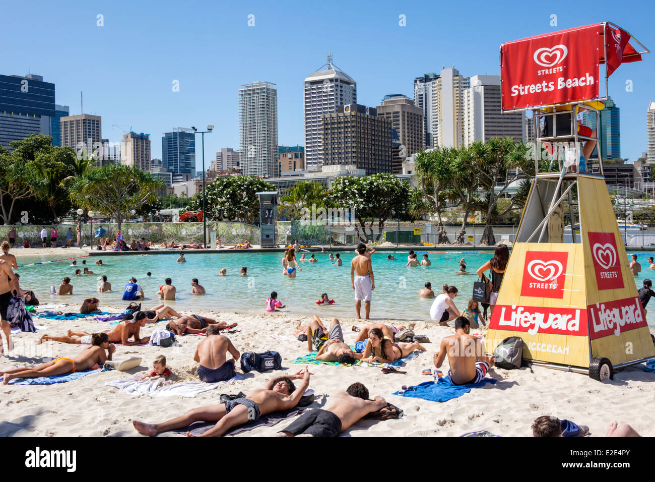 Brisbane Australia,Queensland Southbank Parklands,Streets Beach,sunbathers,sand,water CBD,city skyline cityscape,skyscrapers,buildings,visitors travel Stock Photo