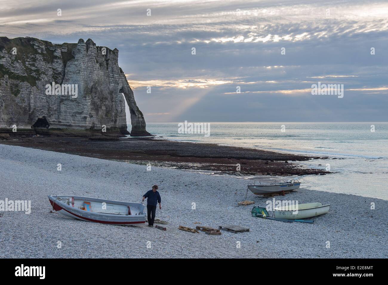 France, Seine Maritime, Etretat, fishing boats on the beach, arch of ...