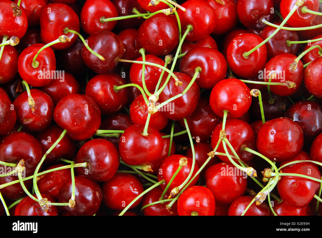 Fresh ripe cherry background Stock Photo - Alamy