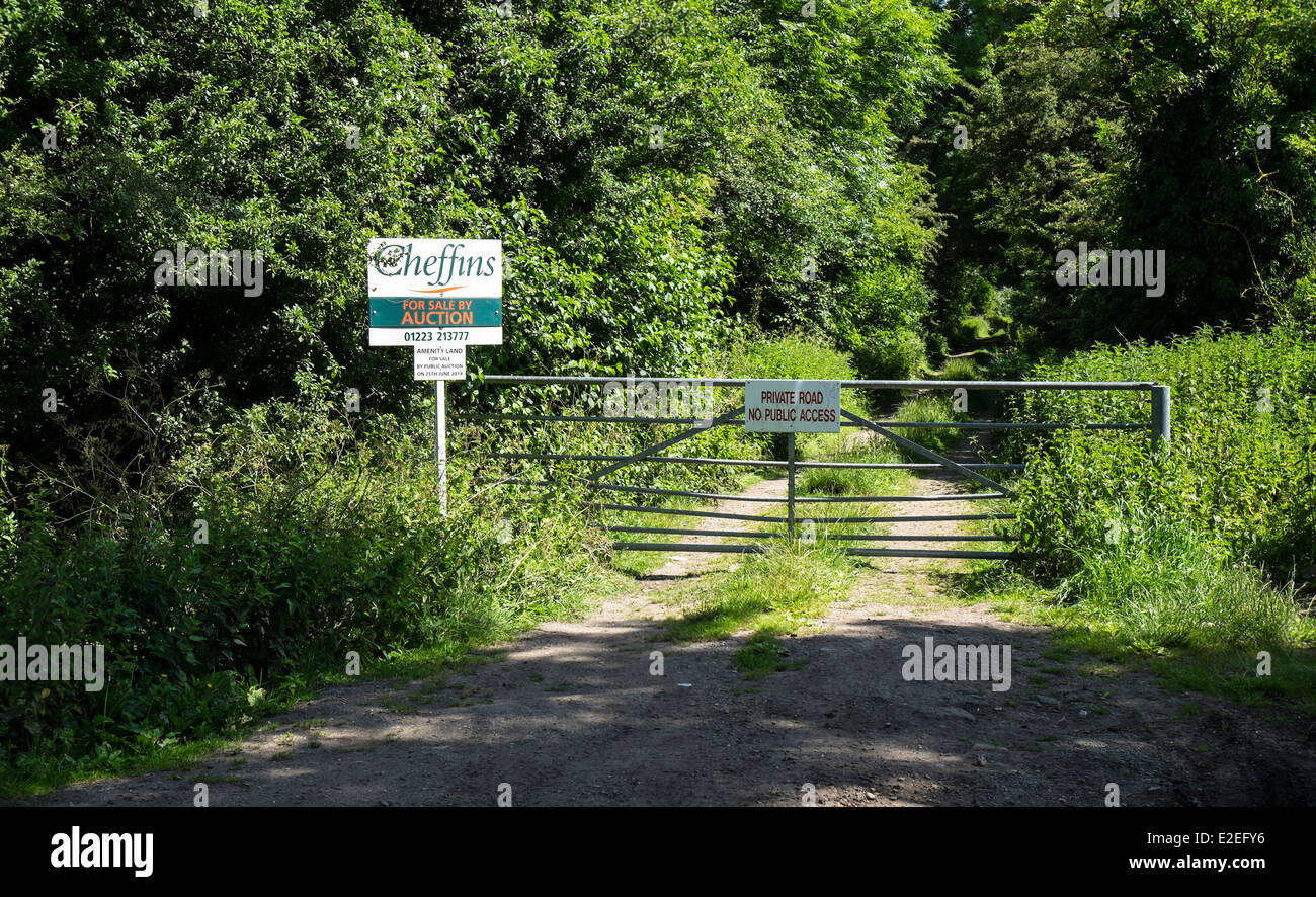 Parcel of land for sale down narrow gated track Stock Photo Alamy
