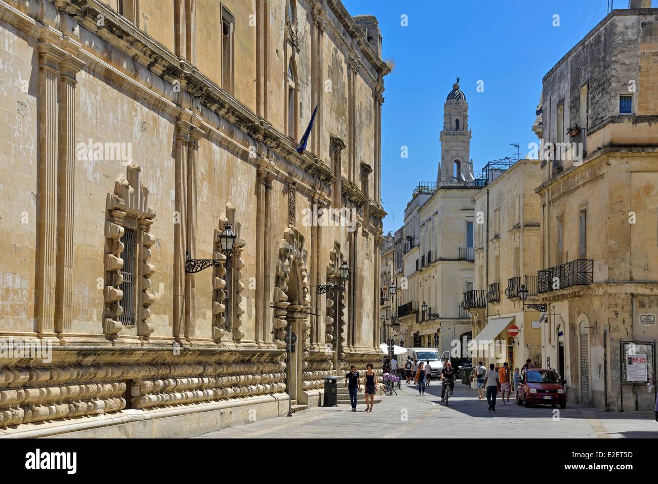 Italy Puglia Lecce province Lecce Via Libertini comings and goings of walkers with the Bell Tower of the background Place Duomo Stock Photo