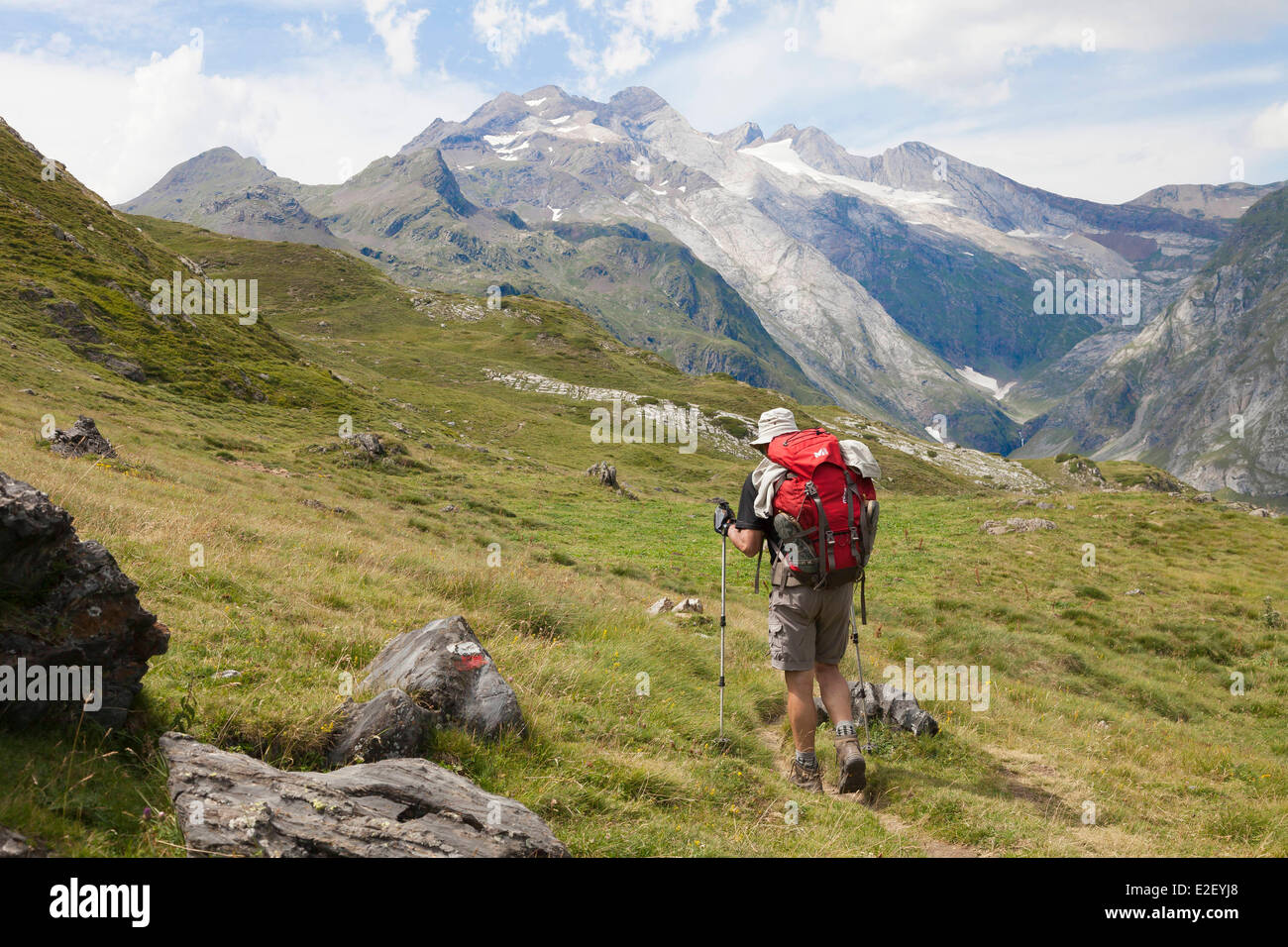 France, Hautes Pyrenees, Gavarnie, Vignemale massif, hiker on the GR10 footpath, Ossoue valley Stock Photo