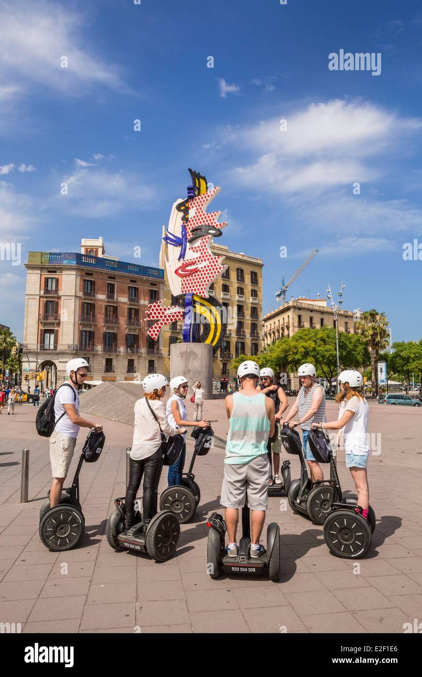 Spain, Catalonia, Barcelona, Port Vell, sightseeing in Segway, sculpture Cap de Barcelona (1992) Stock Photo