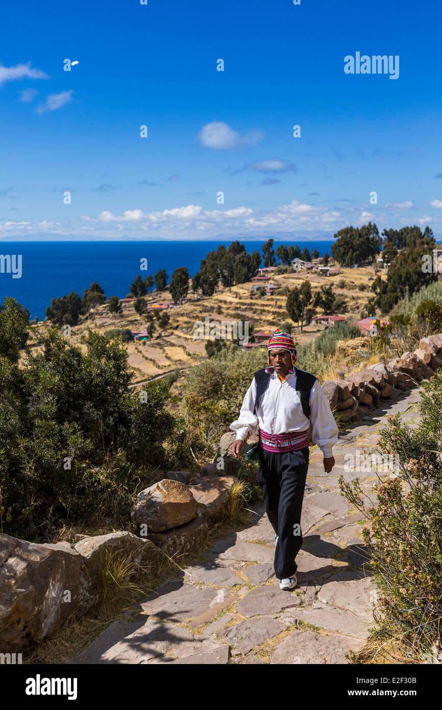 Peru, Puno Province, Lake Titicaca, Taquile Island, a resident in traditional clothes Stock Photo